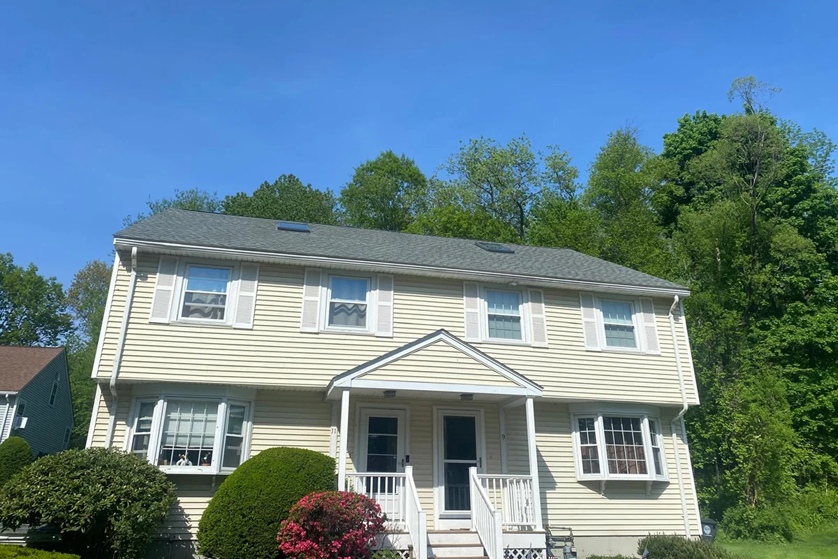 Winter Hill Roofing crew completing a residential project