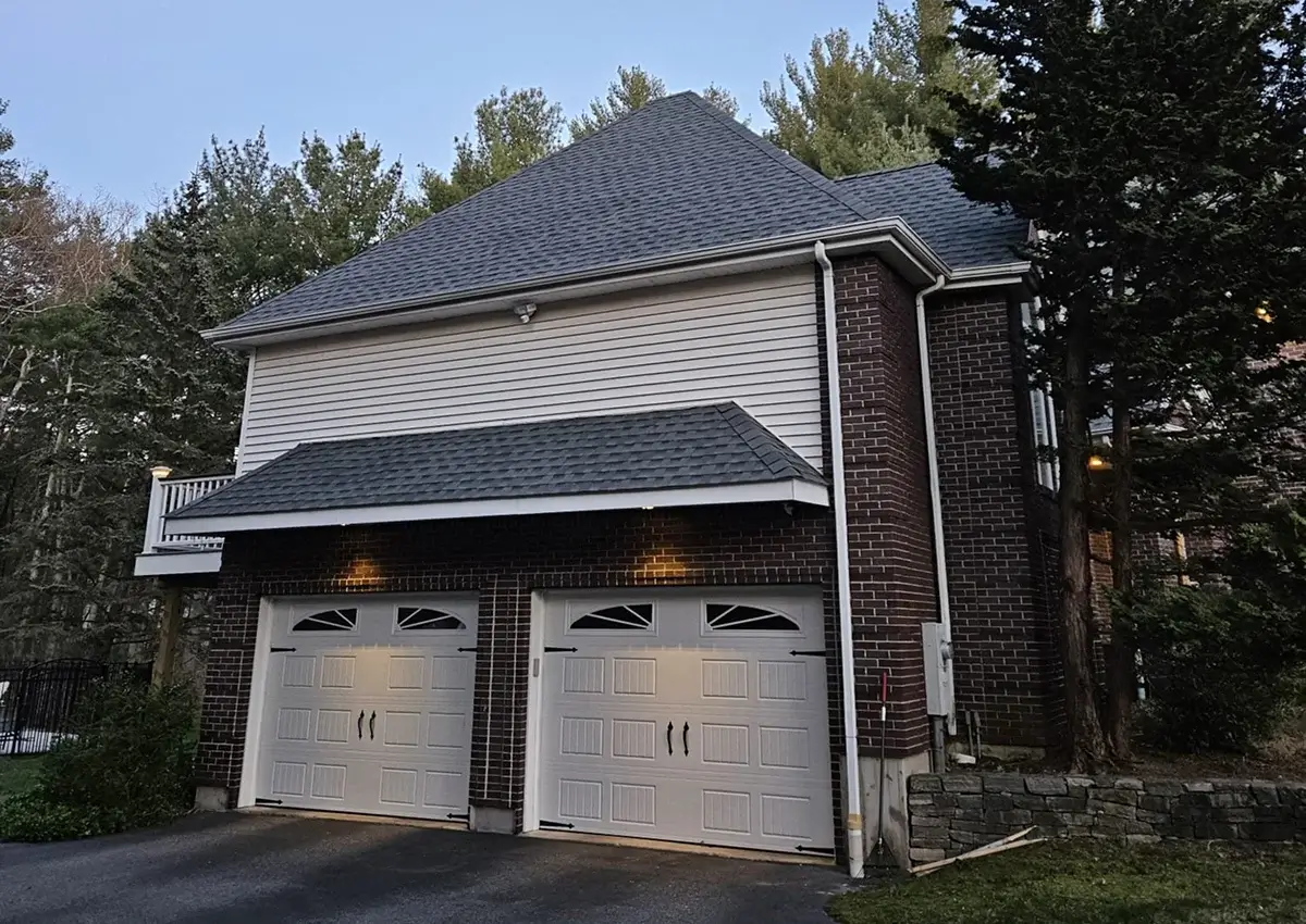 Winter Hill Roofing crew completing a residential project